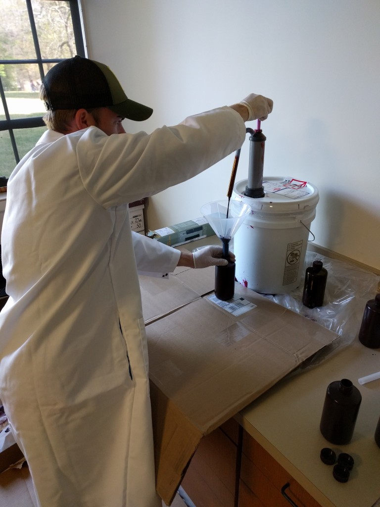 Pumping dye into nalgene bottles for shipment to Greenland.